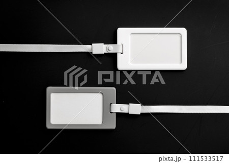 Blank badges on black background top view Blank badges on black background top view 111533517