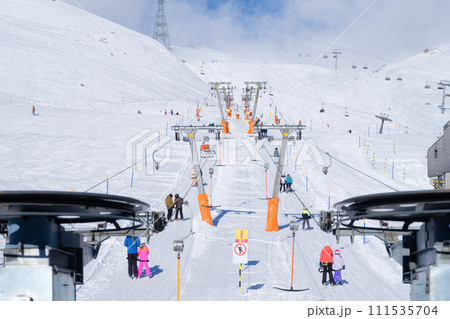 Ski resort. Elevator to the mountain slope. Winter mountain landscape. 111535704