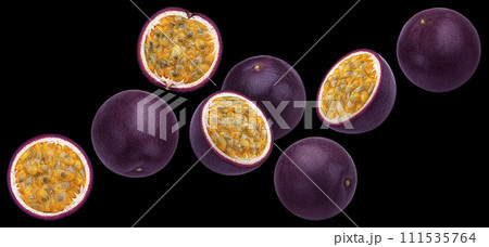 Falling passion fruits isolated on black background 111535764