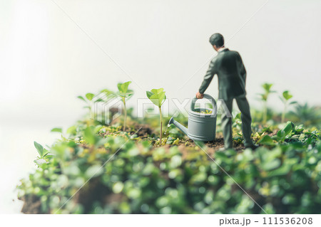 ジョウロで新芽に水をあげるサラリーマン（3D） 111536208