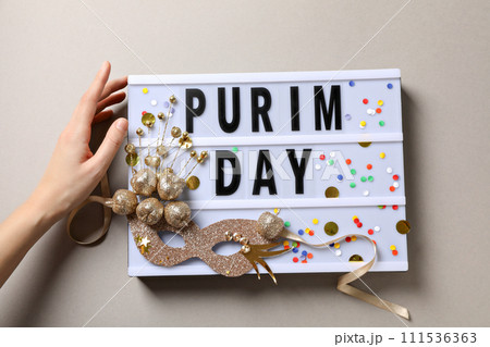 The concept of the holiday Purim, with traditional symbols. 111536363
