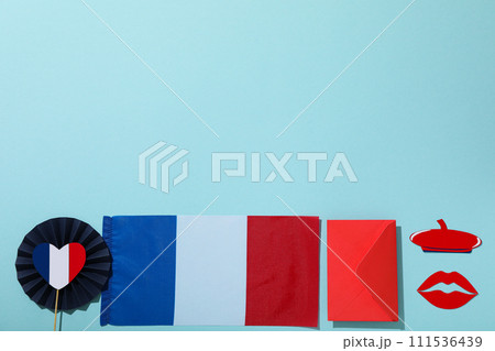Flag of France and other symbols on a blue background. 111536439