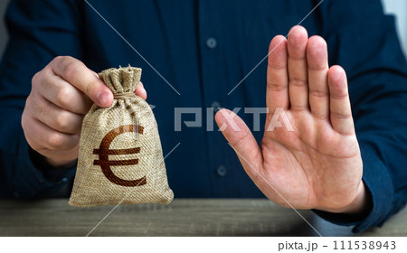 Stop gesture and euro money bag. Financial difficulties. Economic sanctions, confiscation of funds. The man does not approve of the transaction or loan. Asset freeze seizure. Stop gesture and euro money bag. Financial difficulties. Economic sanctions, confiscation of funds. The man does not approve of the transaction or loan. Asset freeze seizure. 111538943