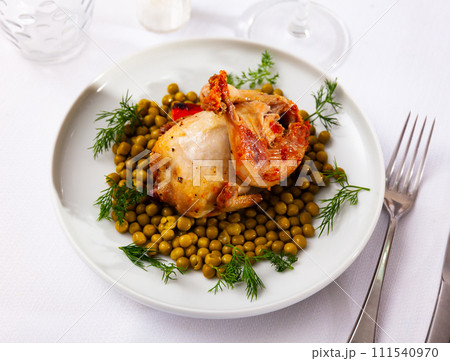 Roasted quail with carrot, green peas and fresh dill Roasted quail with carrot, green peas and fresh dill 111540970