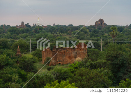 Aerial top view of burmese temples of Bagan City from a balloon, unesco world heritage with forest trees, Myanmar or Burma. Tourist destination. Aerial top view of burmese temples of Bagan City from a balloon, unesco world heritage with forest trees, Myanmar or Burma. Tourist destination. 111543226
