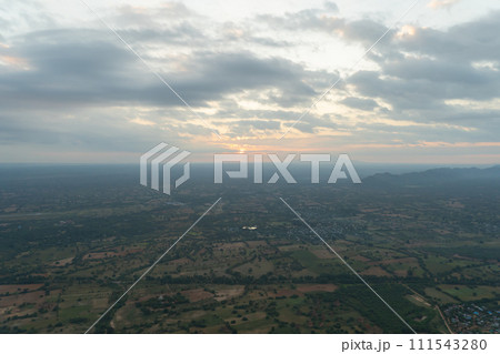 Aerial top view of burmese temples of Bagan City from a balloon, unesco world heritage with forest trees, Myanmar or Burma. Tourist destination. Aerial top view of burmese temples of Bagan City from a balloon, unesco world heritage with forest trees, Myanmar or Burma. Tourist destination. 111543280