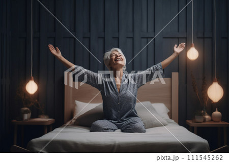 Elderly Woman Embracing the Day in Pajamas 111545262