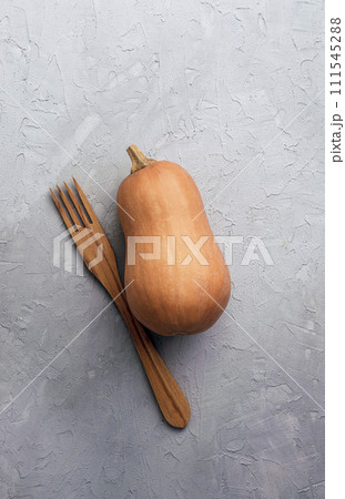 Orange ripe pumpkin. Autumn cozy dinner concept. Healthy vegetarian food. Health. Thanksgiving Orange ripe pumpkin. Autumn cozy dinner concept. Healthy vegetarian food. Health. Thanksgiving 111545288