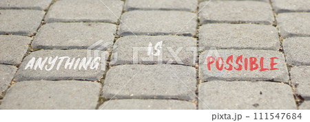 Anything is possible symbol. Concept words Anything is possible on beautiful grey paving slabs. Beautiful grey paving slabs background. Business anything possible concept. Copy space. 111547684