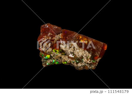 Macro stone Opal mineral in rock on a black background Macro stone Opal mineral in rock on a black background 111548179