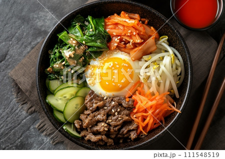 Beef bibimbap on a black background, traditional korean cuisine top view 111548519
