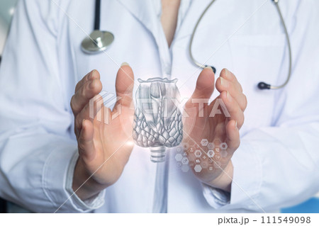 Doctor shows thyroid gland . Doctor shows thyroid gland . 111549098