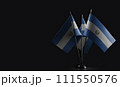Small national flags of the Salvador on a black background 111550576