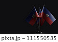 Small national flags of the Australia on a black background 111550585