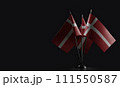 Small national flags of the Denmark on a black background 111550587