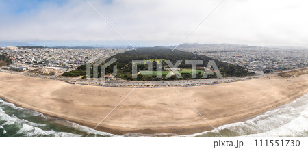 Where the sea meets the land in San Francisco. Ocean Beach is a world renowned surfing beach in the Sunset district of San Francisco. Cliff house building on the cliffs. Where the sea meets the land in San Francisco. Ocean Beach is a world renowned surfing beach in the Sunset district of San Francisco. Cliff house building on the cliffs. 111551730