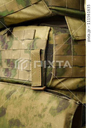 Soldier wearing military uniform close up photo Soldier wearing military uniform close up photo 111561635