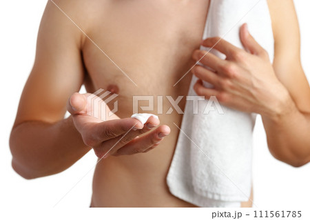 Unrecognizable man holding shaving foam in hands against white background 111561785