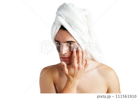 Portrait of attractive young male model with eye patches on white background 111561910