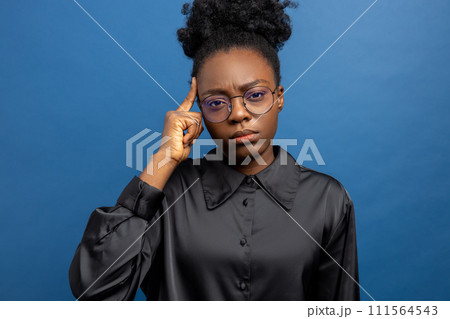 African american young woman having a headache and looking stressed 111564543