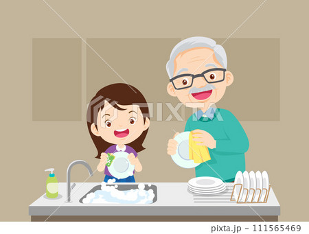 Happy kid helping family washing dishes at home 111565469