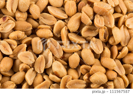 large amount of peeled salted peanuts large amount of peeled salted peanuts 111567587