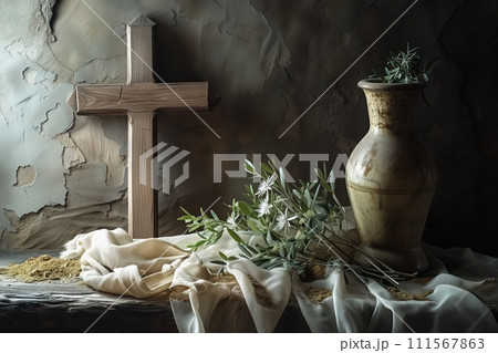 Still life with a cross, scattered ashes, and olive branches, symbolizing hope and renewal. Still life with a cross, scattered ashes, and olive branches, symbolizing hope and renewal. 111567863