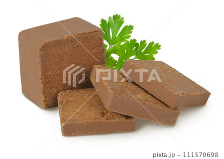 Brown cheese. Norwegian brunost isolated on white background with full depth of field 111570698