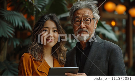 AI-generated content. The two professional business people are standing in the corporate office meeting room using digital tablet technology while discussing financial market data. 111575081