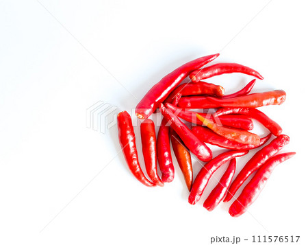 Fresh red chili and space for text on wooden background Fresh red chili and space for text on wooden background 111576517