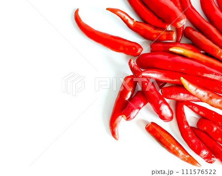 Fresh red chili and space for text on wooden background 111576522