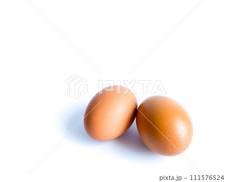 Chicken eggs on the white background Chicken eggs on the white background 111576524