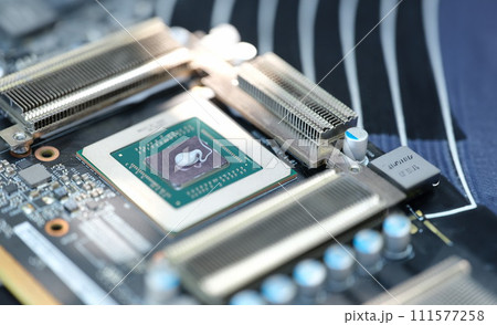 Thermal paste lying on processor from video card closeup 111577258