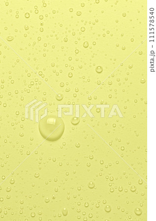 Drops of micellar water or cosmetic tonic on a yellow background. Closeup, macro photography. Copy space Drops of micellar water or cosmetic tonic on a yellow background. Closeup, macro photography. Copy space 111578540