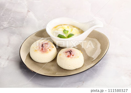 Curd pancakes with sour cream Curd pancakes with sour cream 111580327