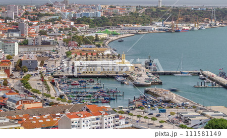 Aerial view of marina and city center timelapse in Setubal, Portugal. Aerial view of marina and city center timelapse in Setubal, Portugal. 111581149