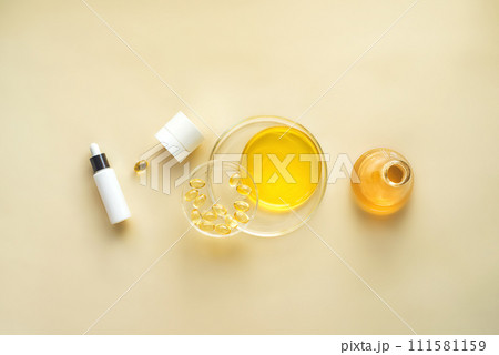 Cosmetics background concept by Skin Care. Hydration cosmetics with oils and serums. Skin Care with Omega 3 Oil and Vitamin C, A Scientific Approach to Development of Hydration Cosmetics in Laboratory 111581159