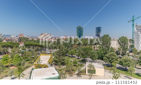 Panorama showing cityscape over Tirana with its colorful apartment buildings and skyscrapers timelapse, Tirana, Albania. 111581432