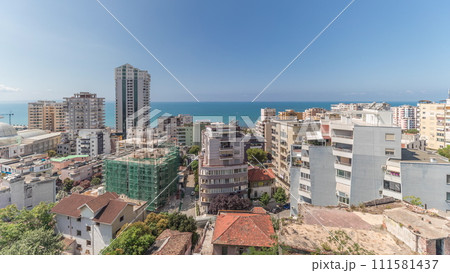 Panorama showing aerial view of city centre and the harbour of Durres timelapse from viewpoint, Albania. 111581437