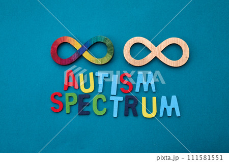 Celebrating Autism Acceptance Month. The gold infinity symbol 111581551