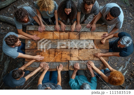 The concept of teamwork, cohesion and cooperation. There are a lot of people sitting at the table 111583519