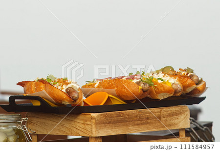 Stall with hotdogs on display at the Prague farmers market. 111584957