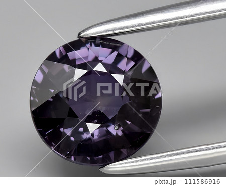 natural purple sapphire gem on the background 111586916