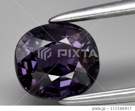 natural purple sapphire gem on the background 111586917