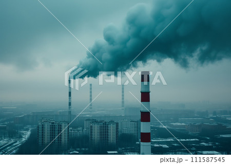 A tall smokestack releasing a thick plume of white smoke into the clear blue sky, symbolizing industrial pollution and environmental issues. 111587545