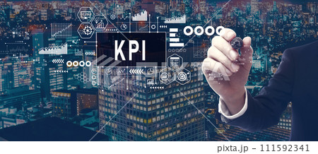 KPI - Key Performance Indicator theme with businessman in city at night 111592341