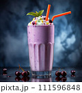 Delicious chokeberry milkshake with a straw Delicious chokeberry milkshake with a straw 111596848