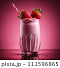 delicious strawberry milkshake with a straw delicious strawberry milkshake with a straw 111596865