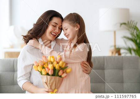 daughter and mom with flowers daughter and mom with flowers 111597765