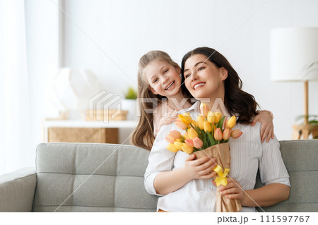 daughter and mom with flowers 111597767